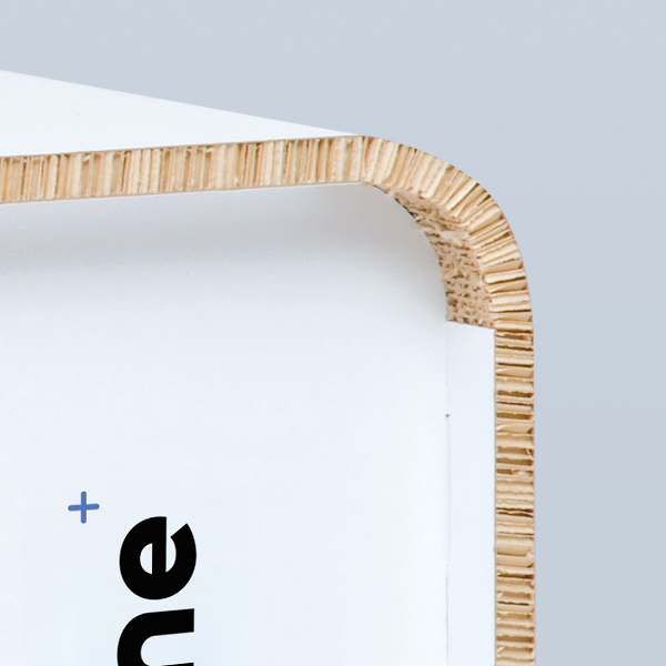 Close-up of the rounded edge of a small cardboard Counter