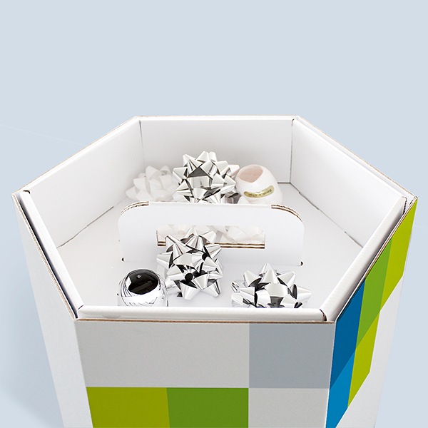 Trageeinsatz der weissen Geschenkpapierbox für Geschenkschleifen